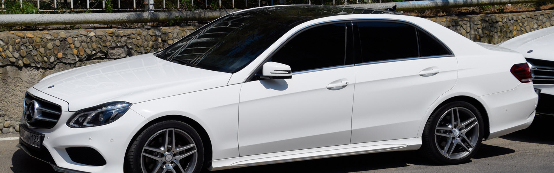 White Mercedes E Class Car